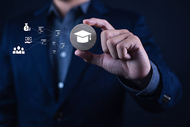 Education funding and scholarship concept with graduation cap icon in business professional hand. Symbolizing academic investment, student financial aid, learning opportunities, tuition support and educational success.