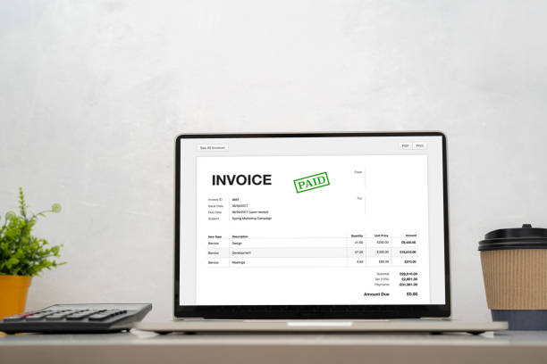 Digital invoice online, laptop or notebook with expenses. using computer calculator.